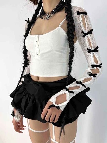Full-arm black and white lace ribbon bolero gloves on model, cutecore and cosplay-ready, little space aesthetic