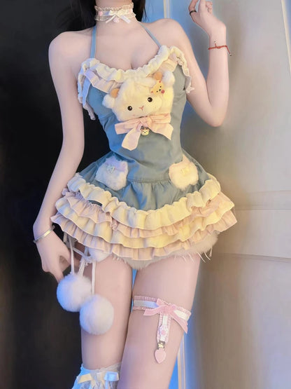 Back view of Little Lamb Plush Mini Dress with layered ruffles and pom-pom hem, pastel soft girl kawaii lolita ddlgirl vibes