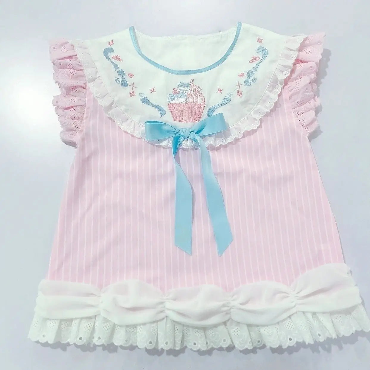 Kawaii little space babydoll tee in soft pastel colors with ruffle and bow details