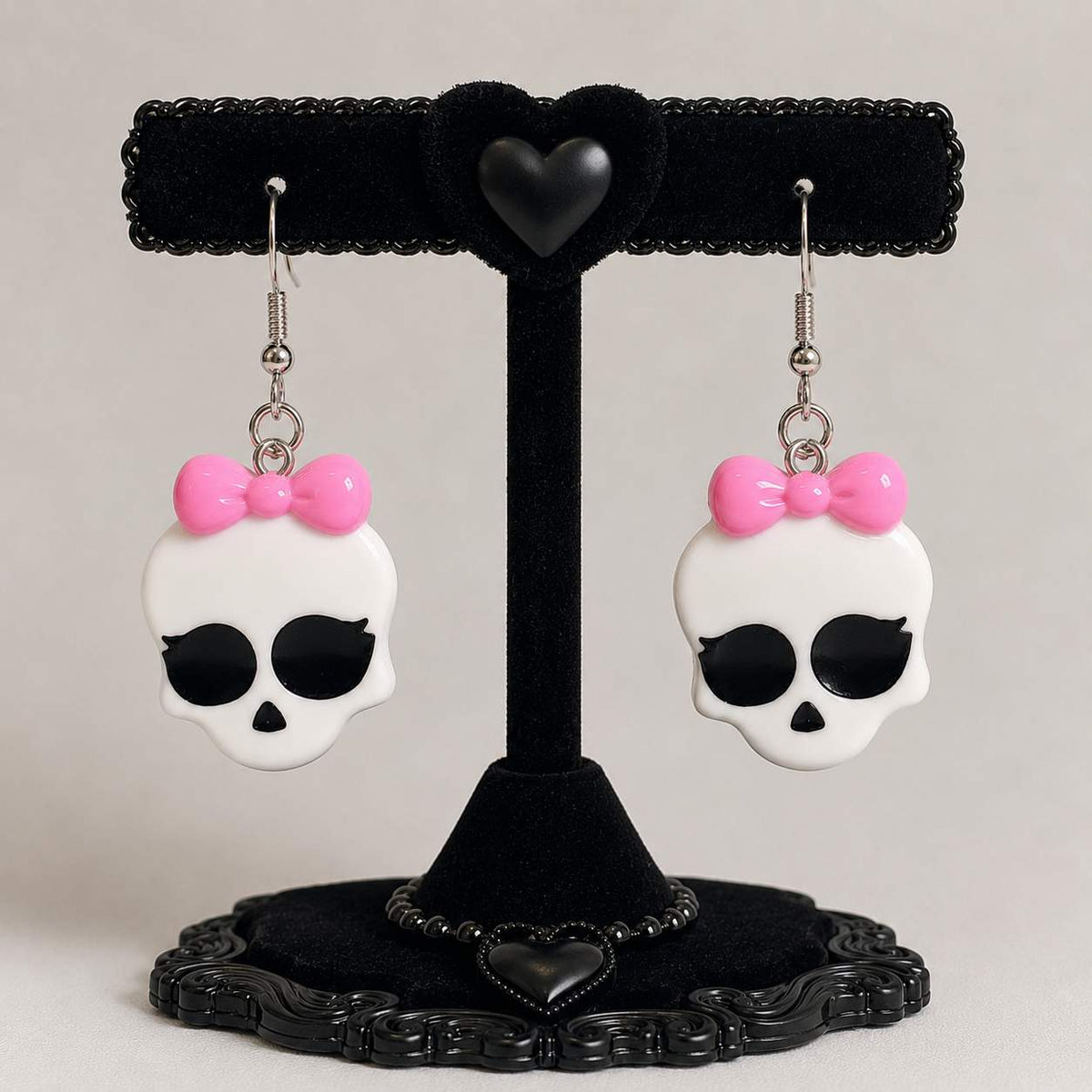 Model wearing kawaii monster babygirl bow earrings, DDLGirl Y2K gothic style