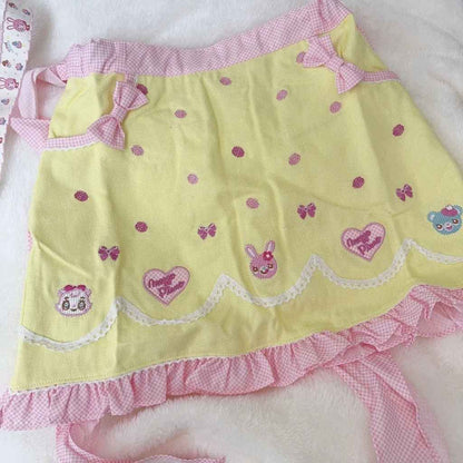 Kawaii pastel skirt with yellow ribbons and animal detail, perfect for Lolita fashion