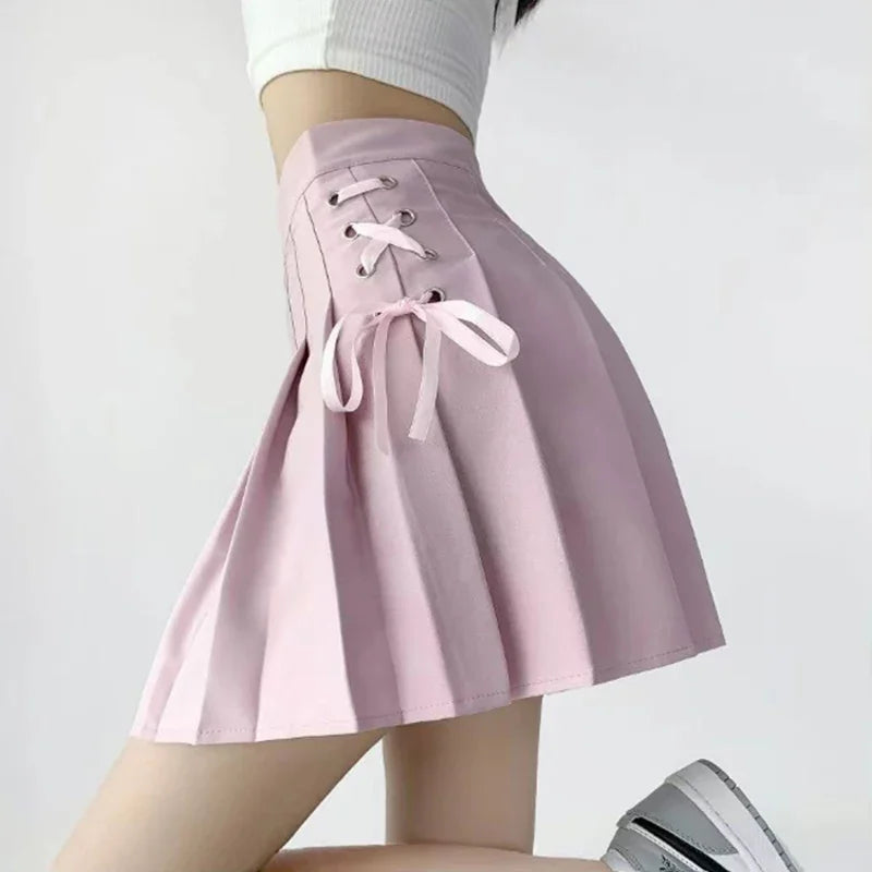 Kawaii pink Dollcore pleated skirt with delicate lace and frilly details for soft girl, cutecore, DDLG, and ABDL fashion