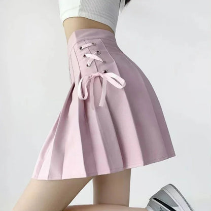 Kawaii pink Dollcore pleated skirt with delicate lace and frilly details for soft girl, cutecore, DDLG, and ABDL fashion