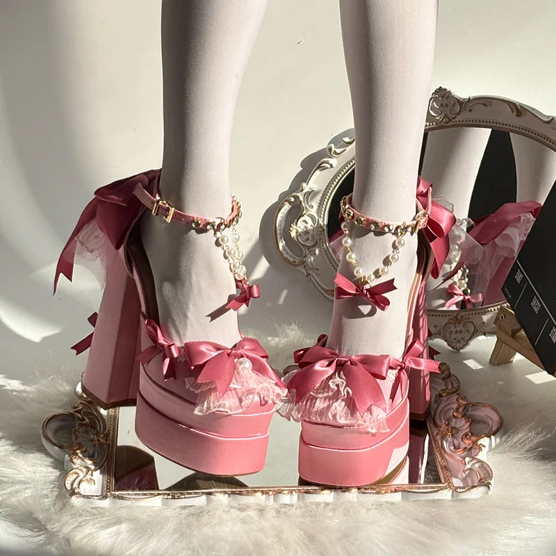 Soft pink Lolita Bombshell heels with intricate lace and playful feminine design