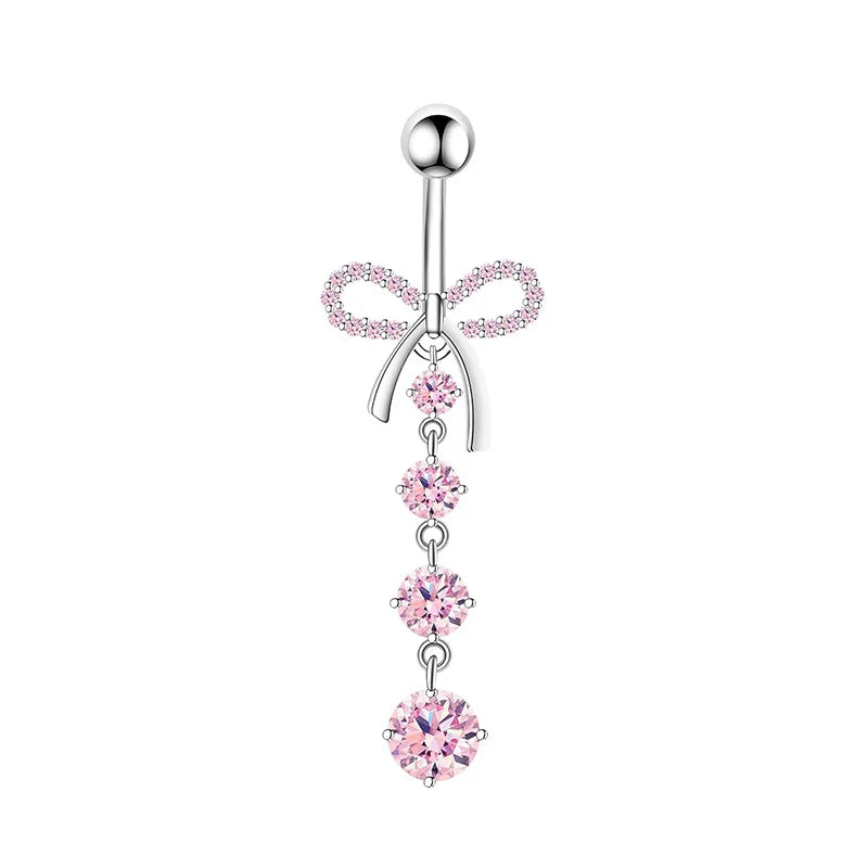 Kawaii navel ring set in pink with sparkly heart and star designs for cute fashion