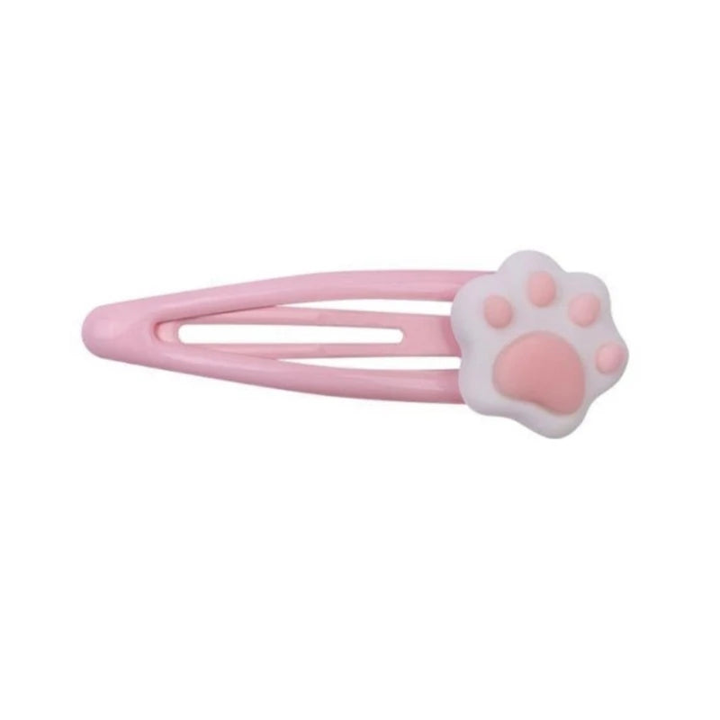 Soft pink paw hair clip designed for kawaii, ABDL, and pastel fashion fans