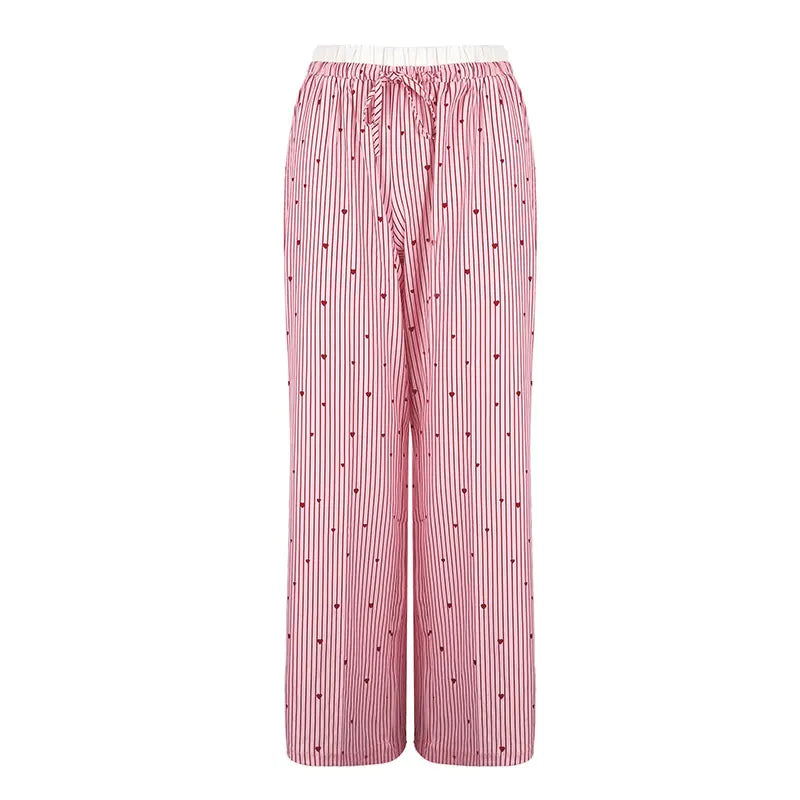 Flirty pink striped lace pants with heart lace-up detail, perfect for kawaii, dollcore, and DDLG aesthetics