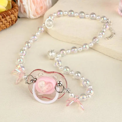 Kawaii rainbow candy pacifier clip with heart and bell ribbon, ideal for soft girl DDLG ABDL vibes