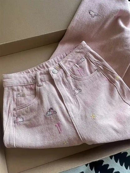 Kawaii pastel denim pants featuring mini sheep, stars, and playful embroidery details
