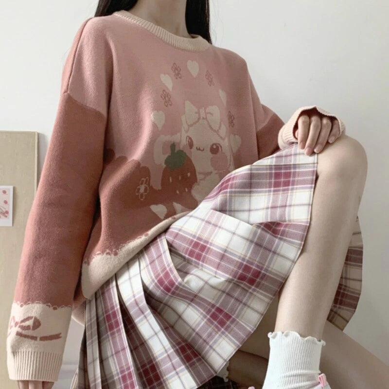 Kawaii Strawberry Bunny Lolita sweater inspired by Harajuku fashion with pastel bunny, ribbons, and heart details
