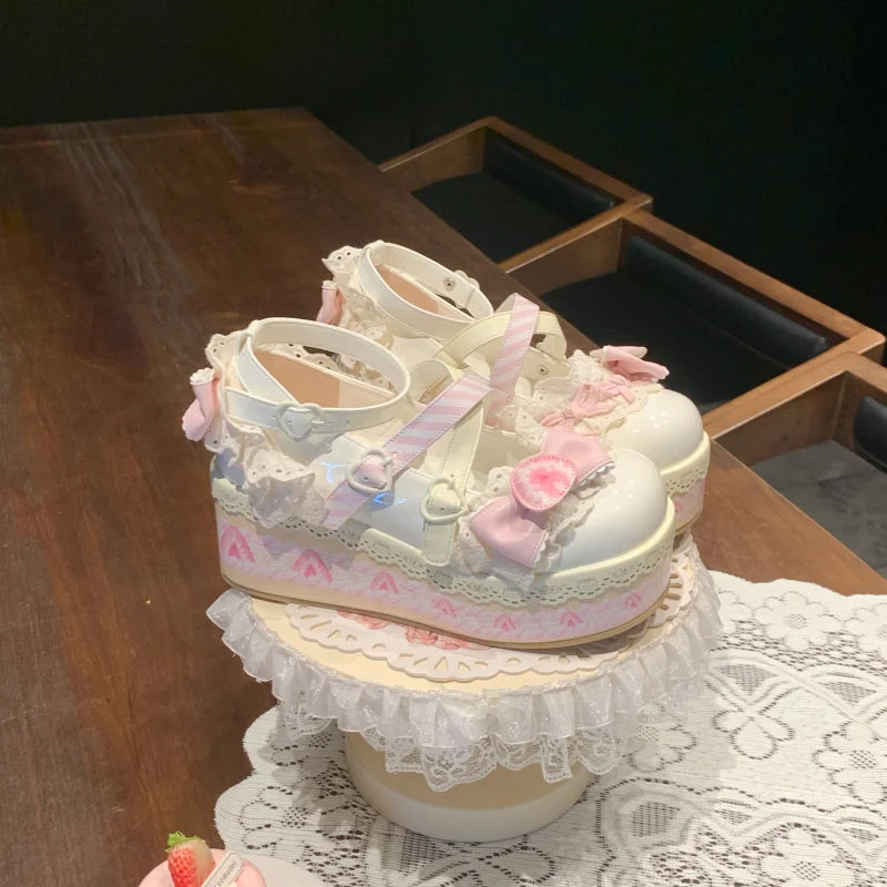 Kawaii Strawberry Sugar Whip Platforms featuring pastel pinks, heart-shaped buckles, lace, and fairycore style for little space outfits