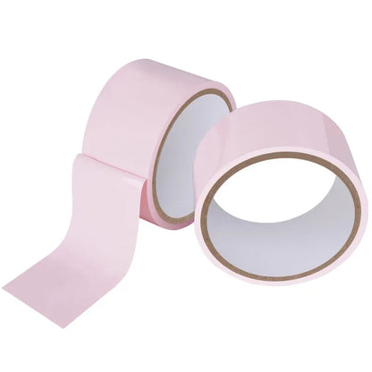 Model in pink Kinky Duct Tape, kawaii cutecore DDLG playful teasing and flirty fun