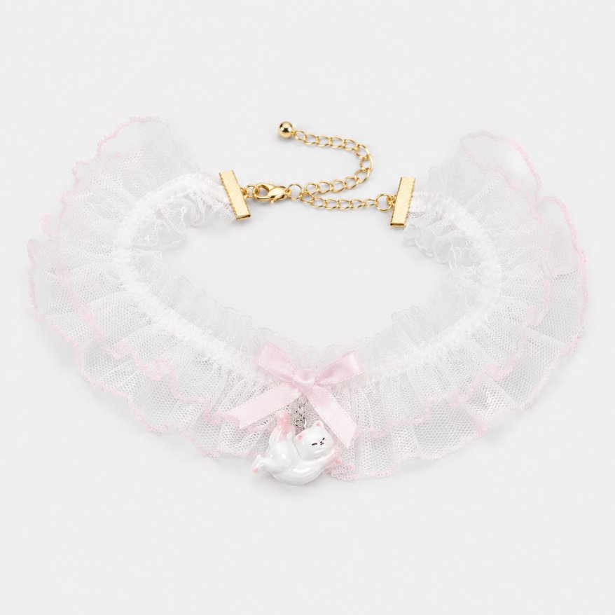 Flat lay of kitty dream ruffle lace choker in both colorways