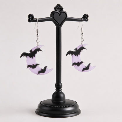 Marbled shimmer effect detail on lavender moon bat dangle earrings