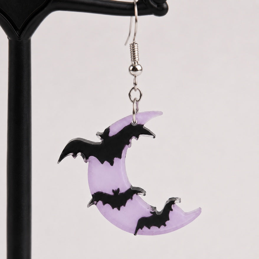 Translucent lavender crescent moon pendant detail with pearlized shimmer