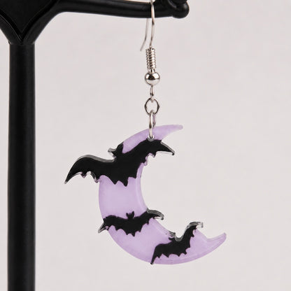 Translucent lavender crescent moon pendant detail with pearlized shimmer