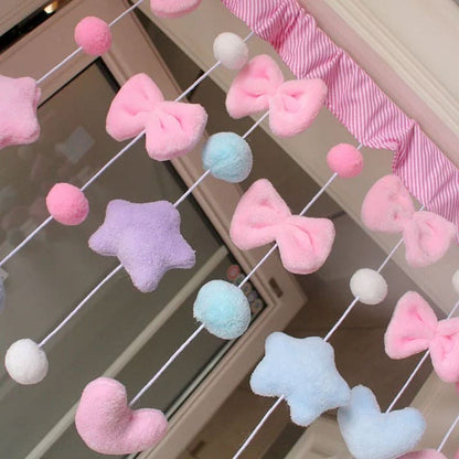 Soft pastel window treatment with magical details ideal for aesthetic room or doorway accents