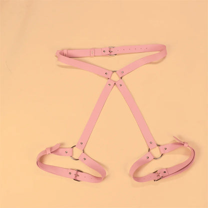 Lightweight pink wrist-to-thigh harness with faux leather straps and delicate cuff details for beginners