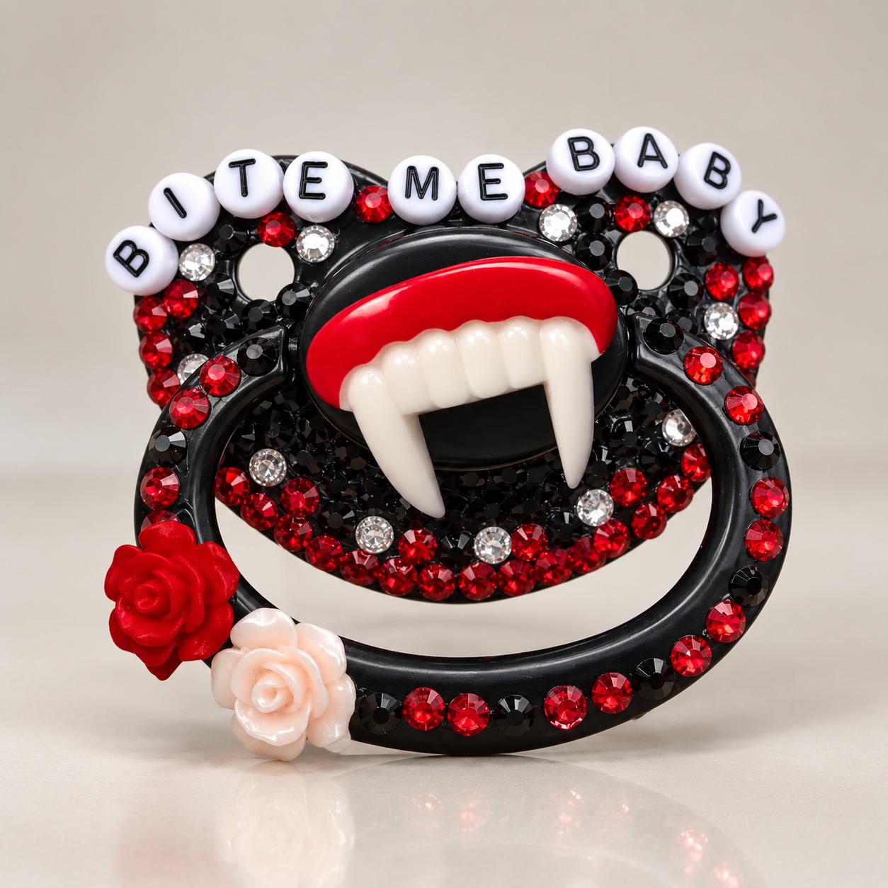 Little Fang Spooky Baby Pacifier in glossy black with rhinestones and fang detail, front view