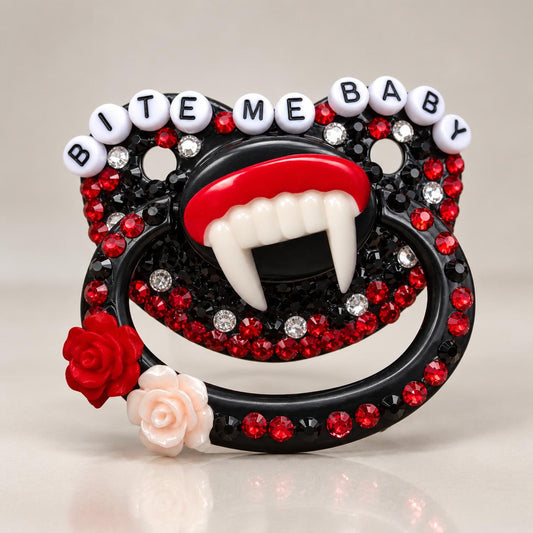 Little Fang Spooky Baby Pacifier in glossy black with rhinestones and fang detail, front view