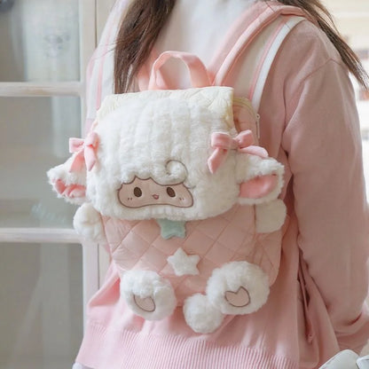 Detail of dangling plush lamb paws and pom pom tail on kawaii backpack
