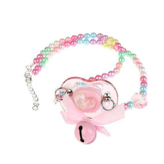 Little rainbow candy pacifier with heart accent, bell ribbon, playful DDLG ABDL kawaii accessory