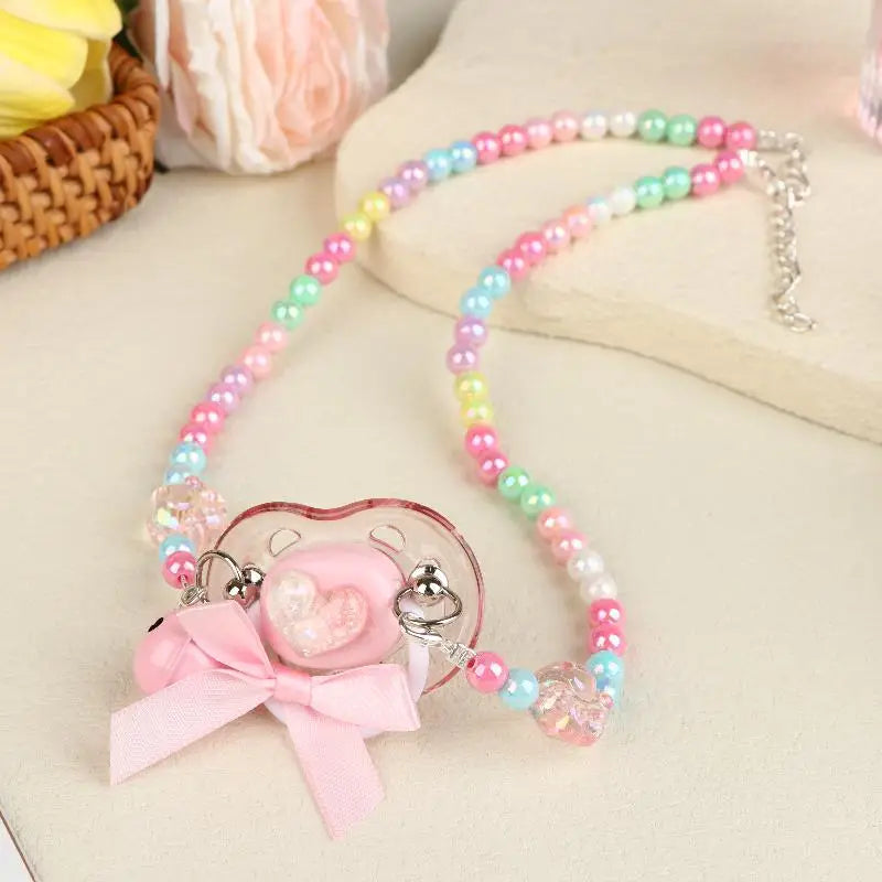 Little soft girl rainbow pacifier with candy bead chain, bell ribbon, DDLG ABDL cutecore accessory
