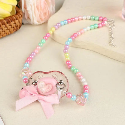 Little soft girl rainbow pacifier with candy bead chain, bell ribbon, DDLG ABDL cutecore accessory