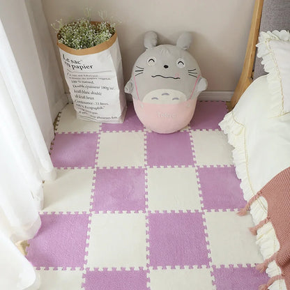 White and pink Little’s floor mat tiles, plush and protective for cozy play spaces in caregiver or DDLG rooms