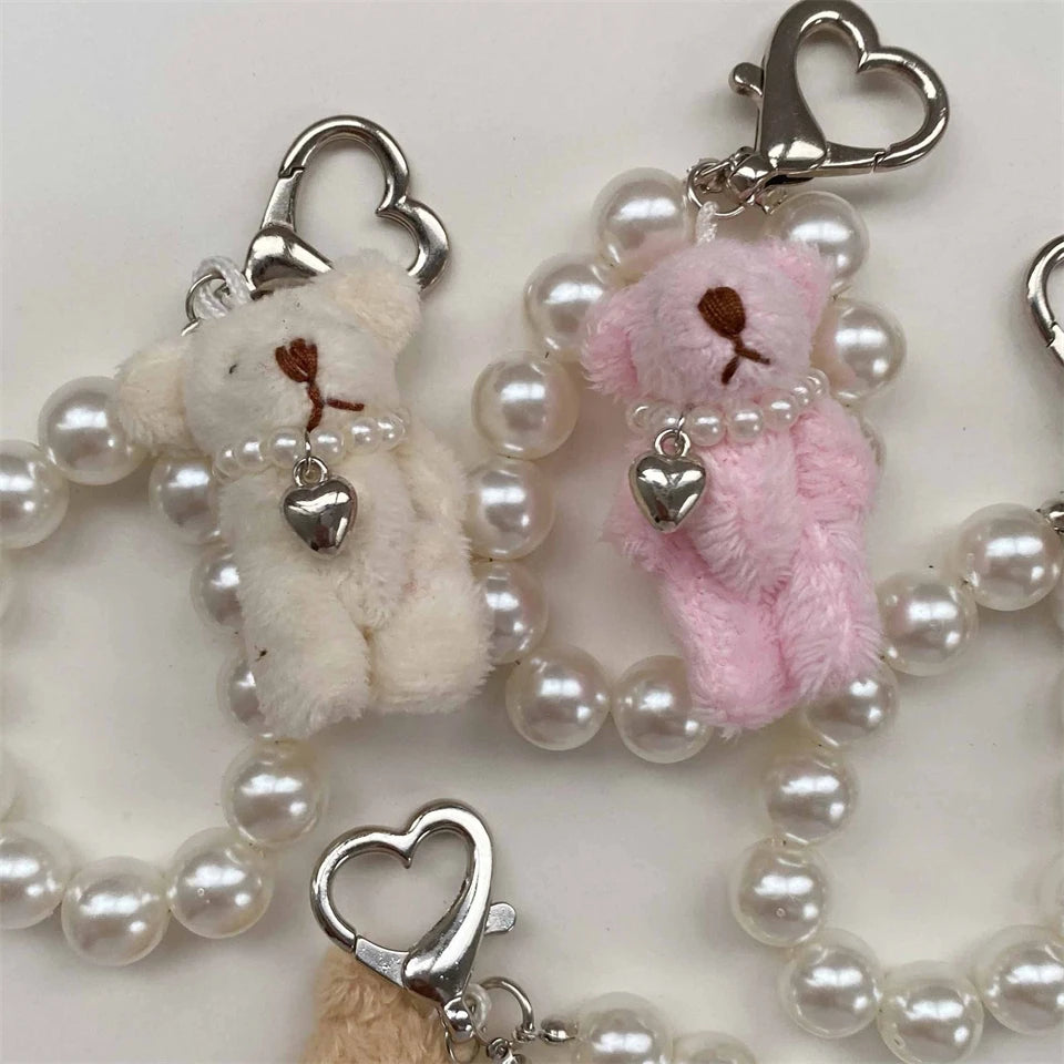 Close-up of Lolita Mini Animal Keychains, cute detailed charms, pastel kawaii aesthetic, ABDL & cutebaddie collectible accessory
