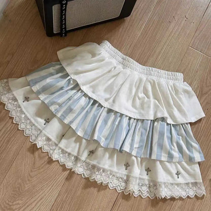 Light blue striped lolita skirt with frilly layers and cross appliqués for DDLG ABDL soft goth and kawaii styles