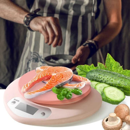 Lightweight pink digital scale with LCD screen and 1g precision for baking, cooking, and portion tracking