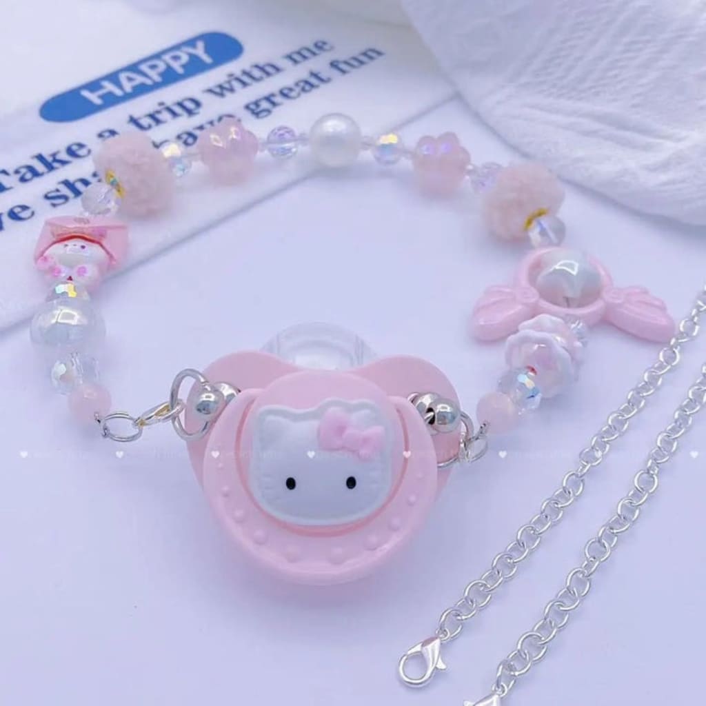 Comfortable silicone pacifier with glowing stars and wings, ideal for relaxation and quiet playtime.