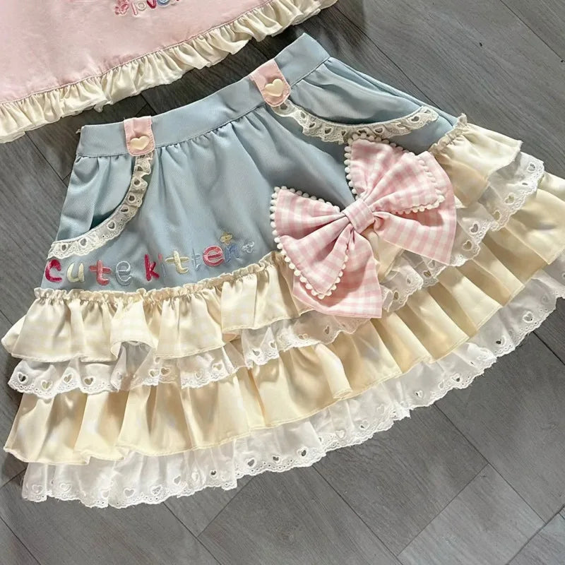 Matching kawaii t-shirt and skirt outfit with bows and pastel charm