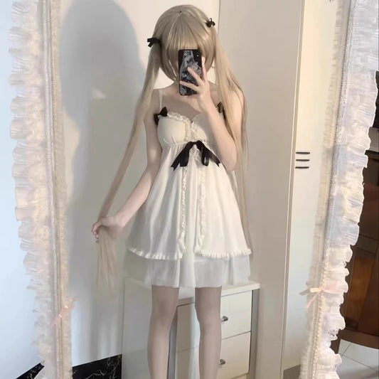 black and white Lolita nightdress with frills and ribbons for dreamy little-space, cutecore, DDLG, and ABDL nights