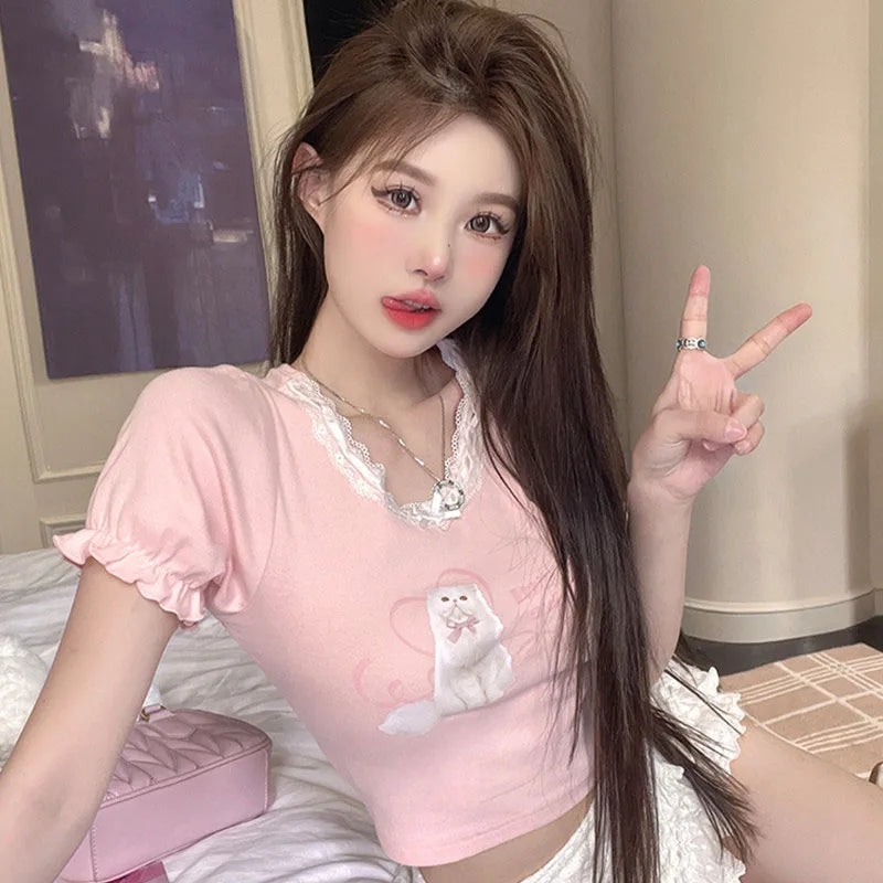 Close-up of My Little Kitty Crop Top in pink, detailed kitty graphic, lace neckline, flirty cutebaddie & ABDL accessory