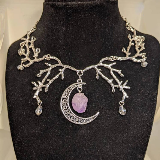 Mystic Amethyst Vine Necklace with purple crystals, crescent moon charm, delicate vine design, mystical vibes