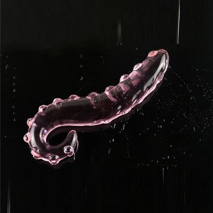 Pink crystal glass wand with raised tentacle texture for fantasy-inspired vaginal or anal play and temperature play.