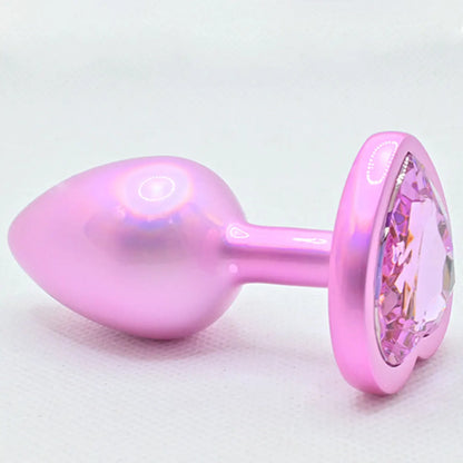 Pastel baddie holographic heart plug with shimmering finish, perfect for kawaii kink play