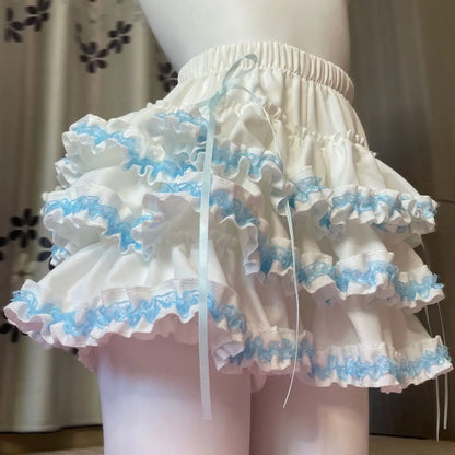 Pastel blue frilly Lolita mini skirt with whipped cream layers for kawaii, cutecore, soft girl, DDLG, and ABDL outfits