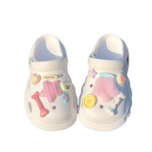 Pastel Crocs charms set with stars, bears, and buttons in kawaii style
