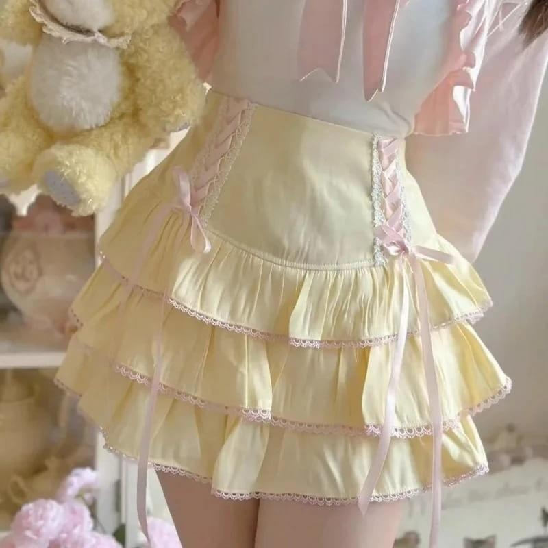 Pastel Lolita high-waist corset skirt with frilly layers and ribbon accents for kawaii and dreamy DDLG outfits