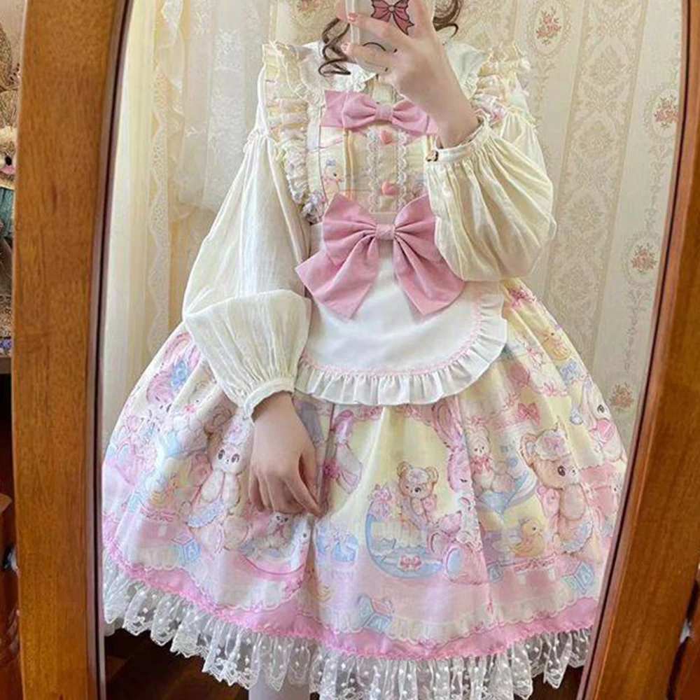 Teddy bear, bunny, and chick print detail on pastel blue and pink Sweet Lolita dress fabric
