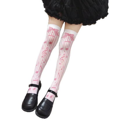 Pastel pink sweet melody note stockings with ribbon hearts and music notes for kawaii cutecore vibes
