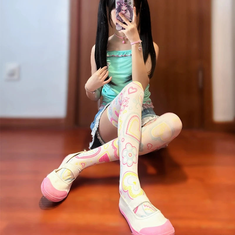 Pastel tricolor stockings with candy hearts, flowers, and playful cutecore DDLG vibes