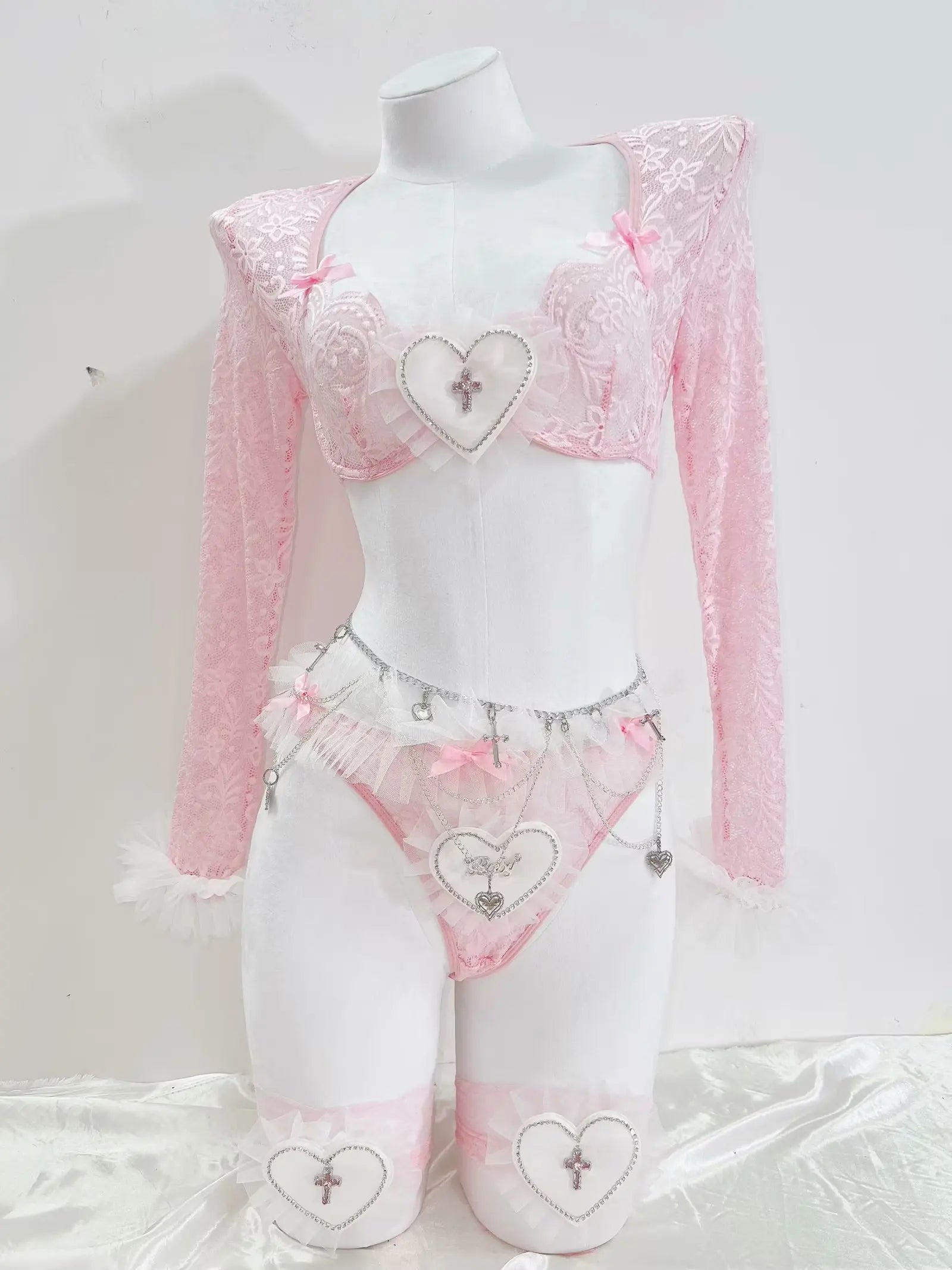 White heart accent detail on pink coquette lace set, angelcore kawaii signature