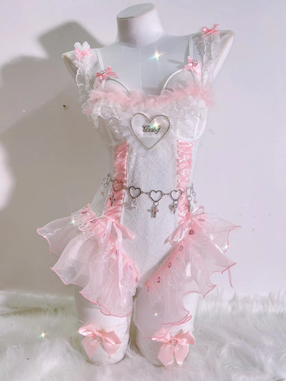 Soft luxe pink ballerina corset set with satin finish, heart details, and “baby” text, perfect for playful babygirl energy