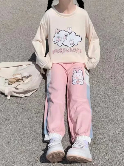 Cozy pink pastel bunny sweatpants with candy drip details, perfect for DDLG and kawaii babycore style