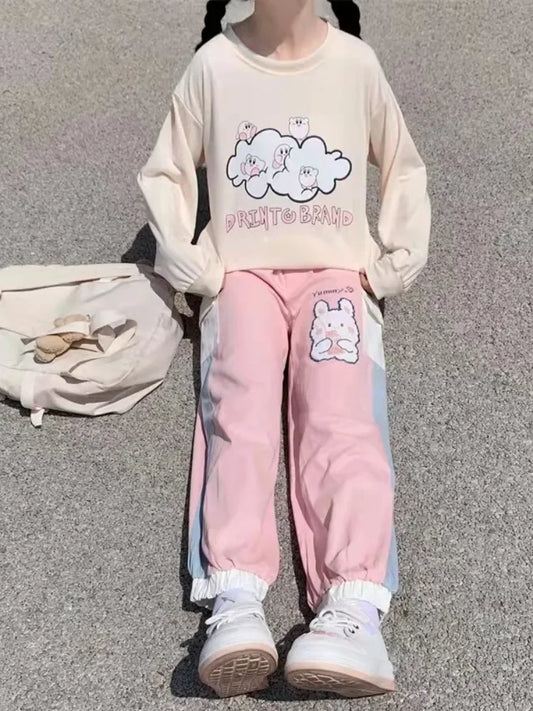 Cozy pink pastel bunny sweatpants with candy drip details, perfect for DDLG and kawaii babycore style