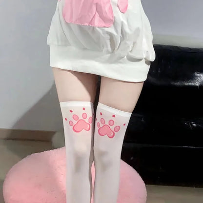 Pink cartoon paw over-the-knee stockings with kawaii motifs for playful cutecore and ABDL outfits